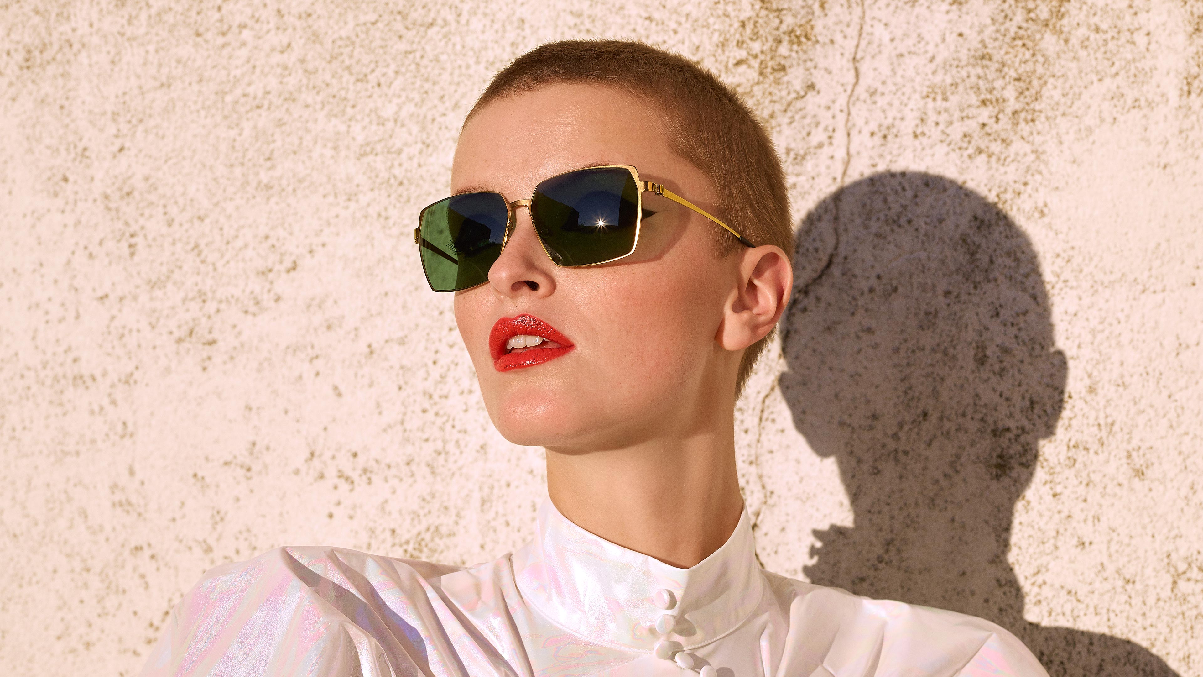 LINDBERG women’s square sun titanium sunglasses in gold tone GT with green tinted lenses SL85